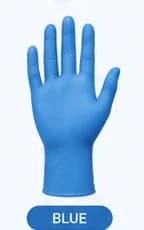 Dental hygienist wearing blue MXGUARD nitrile exam gloves at the chair